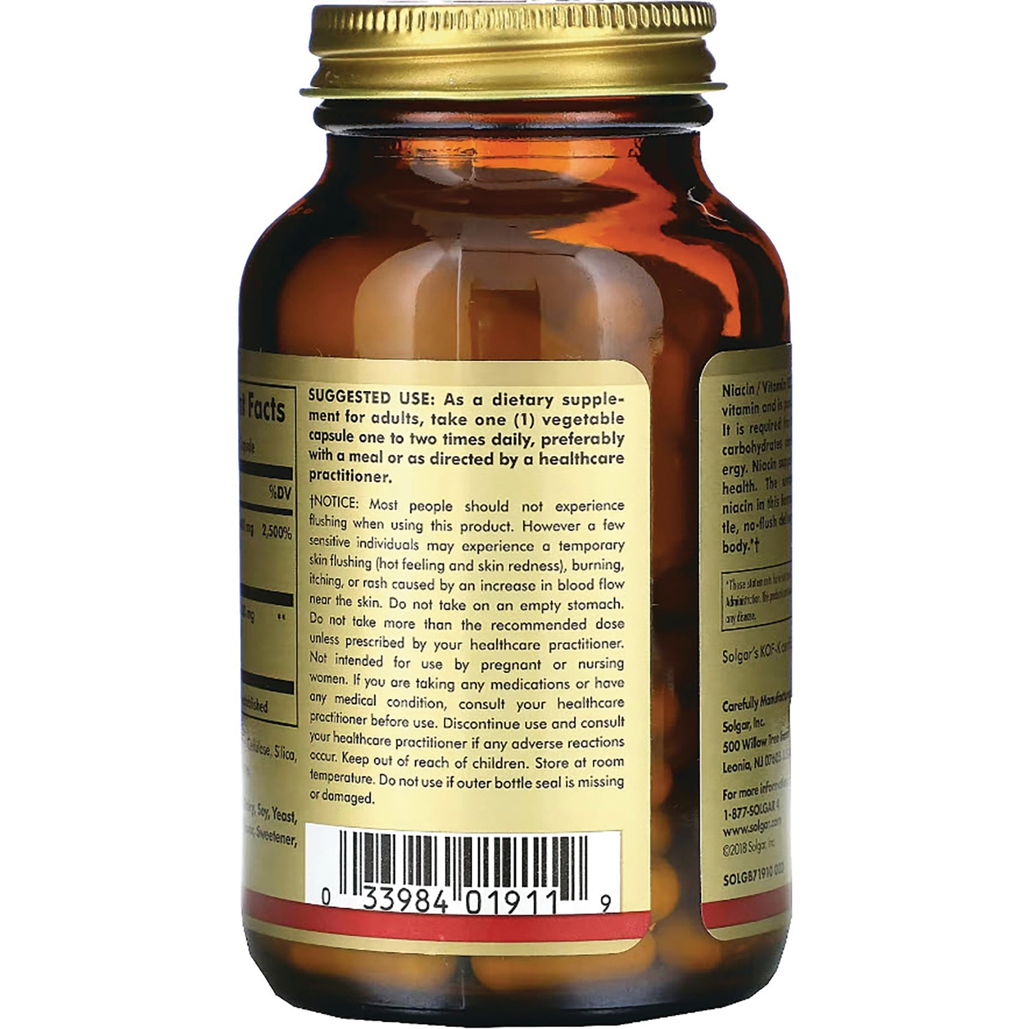 Amber supplement bottle back showing suggested use label, warnings, and barcode