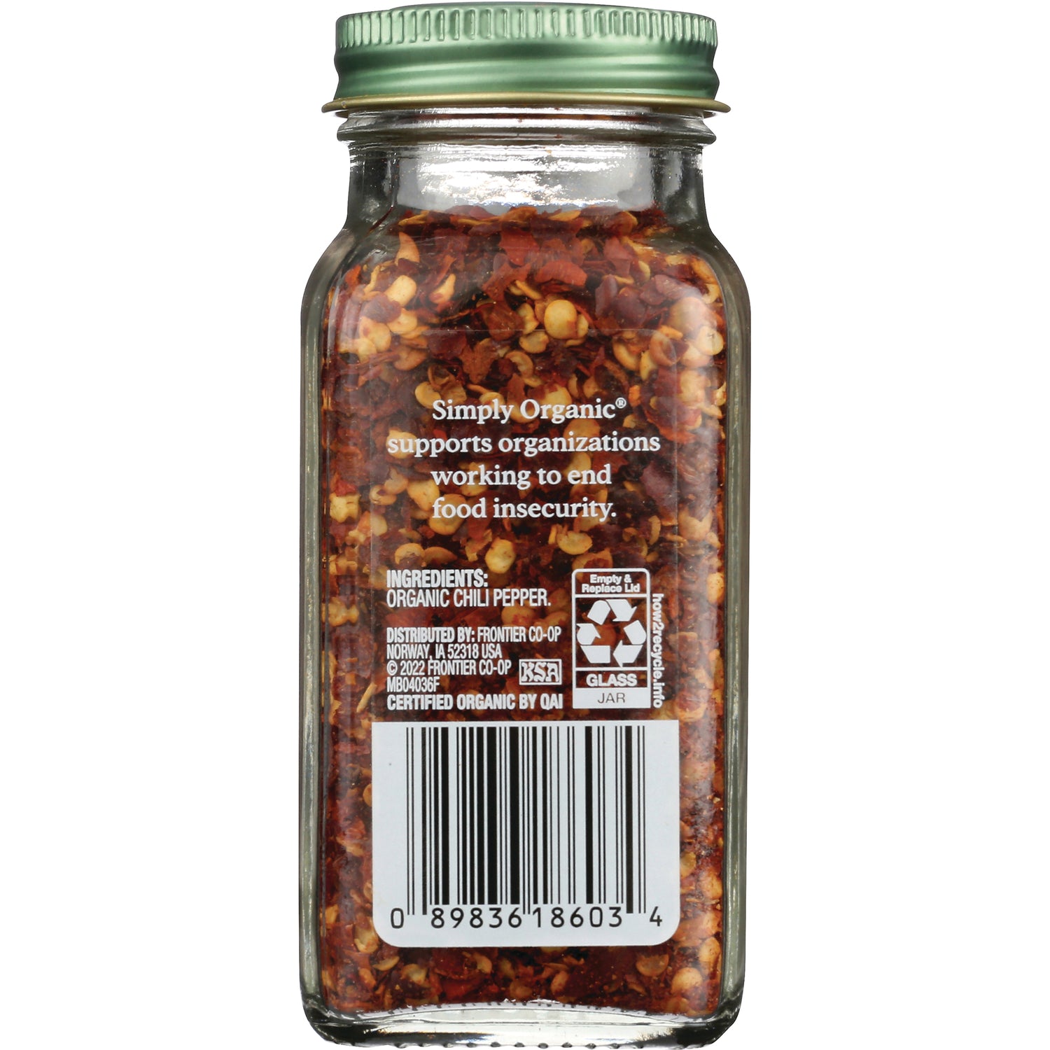 SMP065 | Back label with barcode, recycling info, and ingredients: Organic chili pepper; Simply Organic message about food insecurity