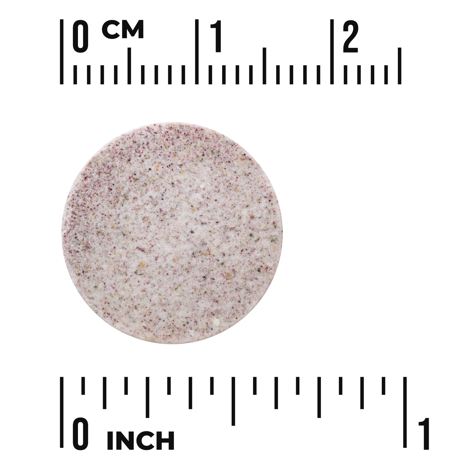 SW1790 | Round speckled tablet shown against centimeter and inch ruler for size