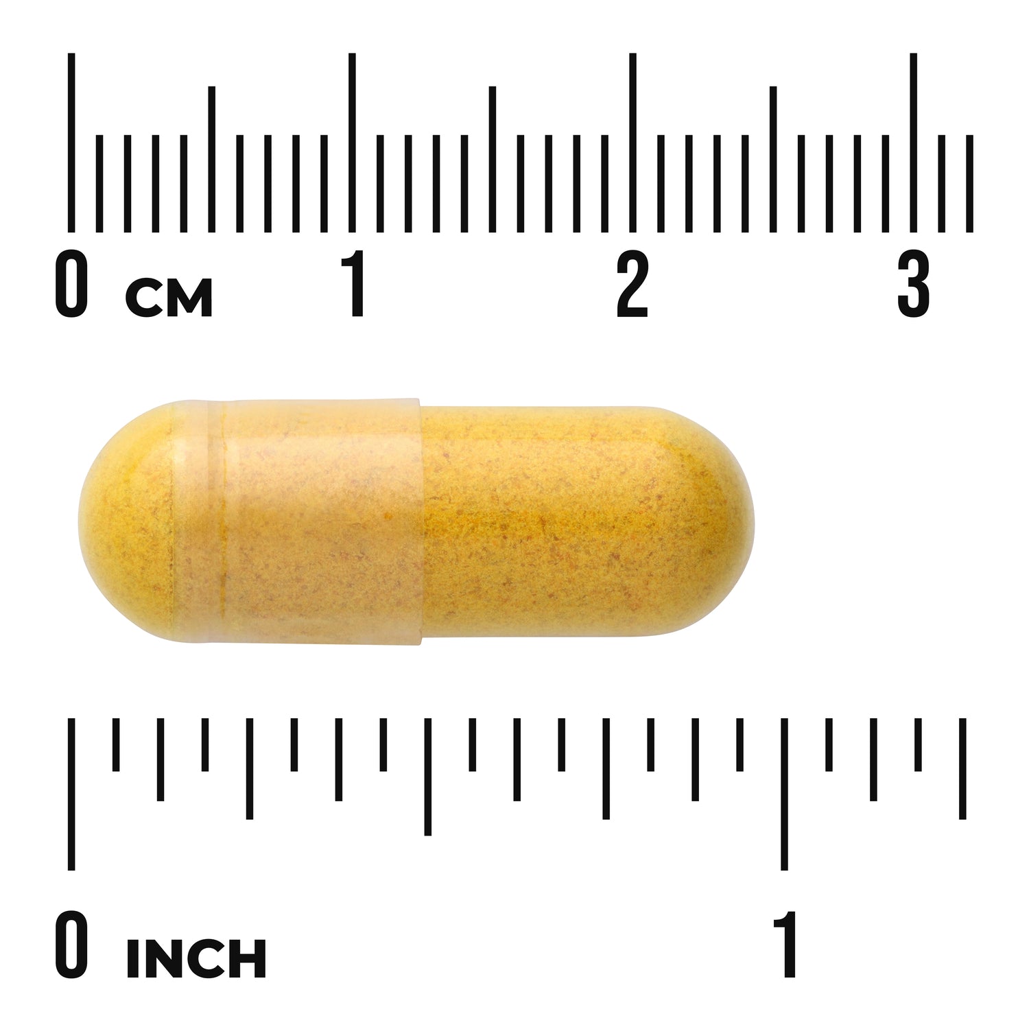 SW940 | Yellow capsule with size reference against cm and inch rulers