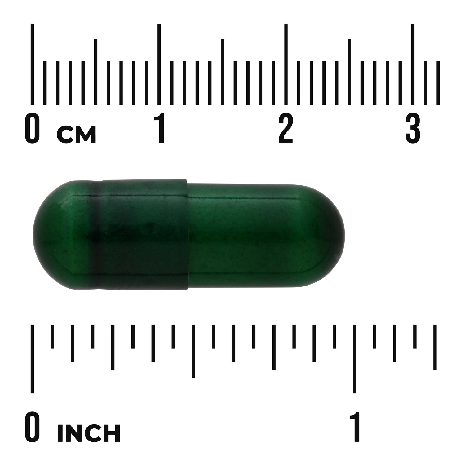 SWC108 | Green capsule with cm and inch rulers for size reference