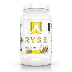 RYS013 | White Ryse Loaded Protein tub, Cinnamon Toast flavor with yellow logo and product name visible