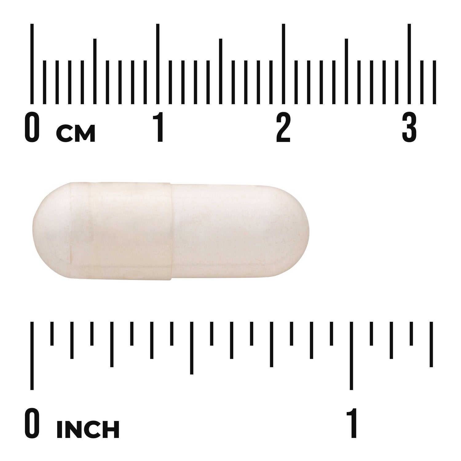 SWU941 | White capsule shown next to centimeter and inch rulers for size reference