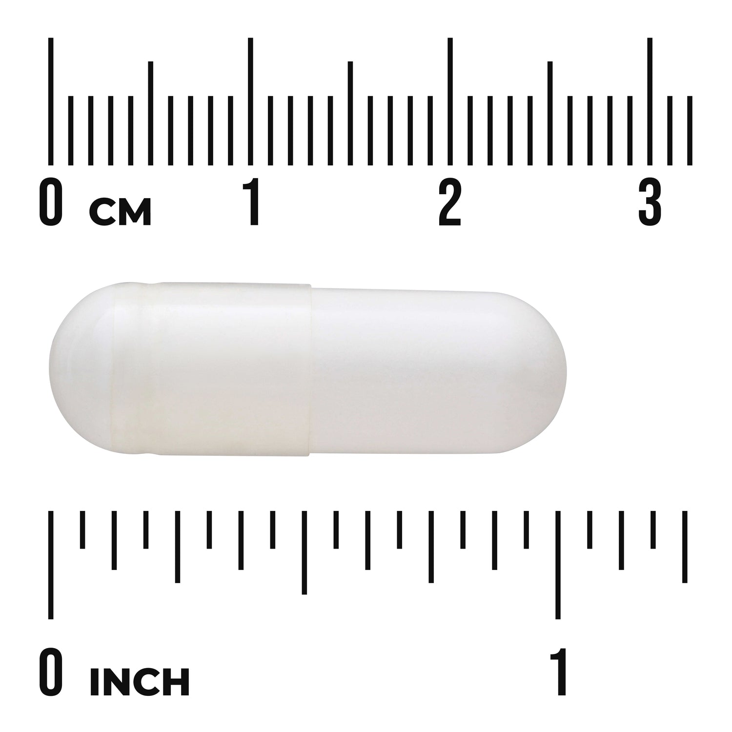 SWU1104 | white capsule centered on centimeter and inch rulers labeled CM and INCH to show size
