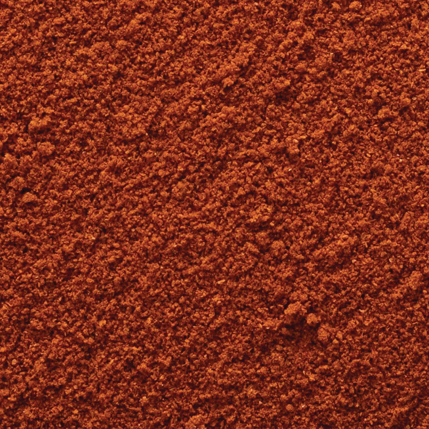 FNP054 | close-up of fine reddish-brown powder texture