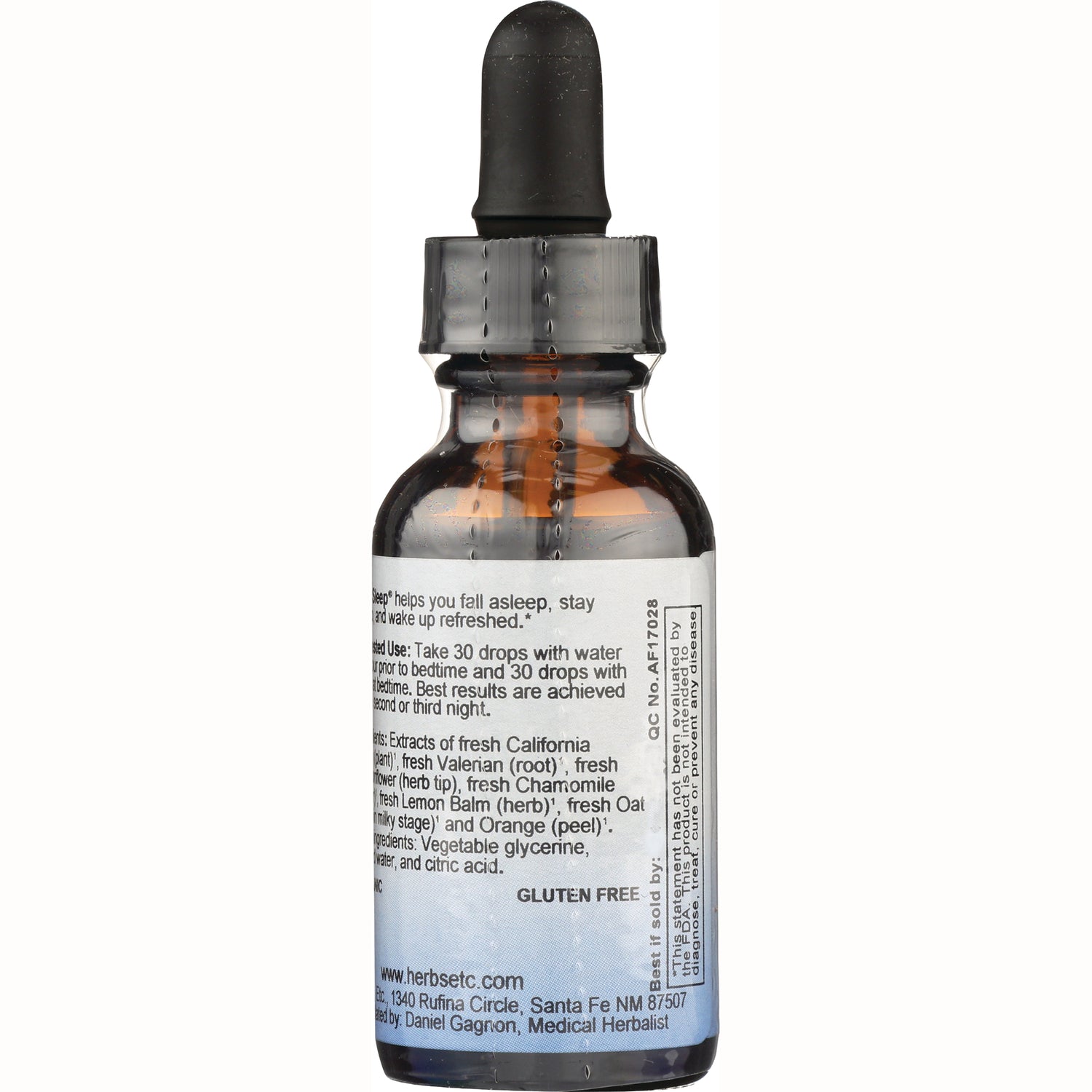 HE104 | Back of amber glass dropper bottle showing ingredient and usage label with visible text GLUTEN FREE