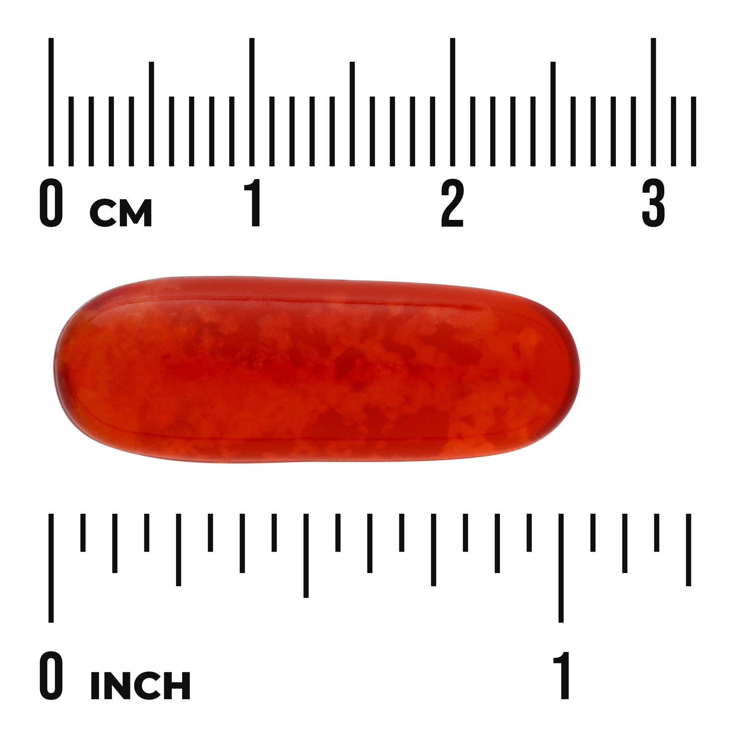 SWE089 | Red softgel capsule with cm and inch rulers for size reference
