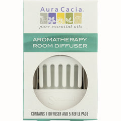 ARC018 | Aura Cacia aromatherapy room diffuser box showing white diffuser through window and text 'Contains 1 diffuser and 5 refill pads'