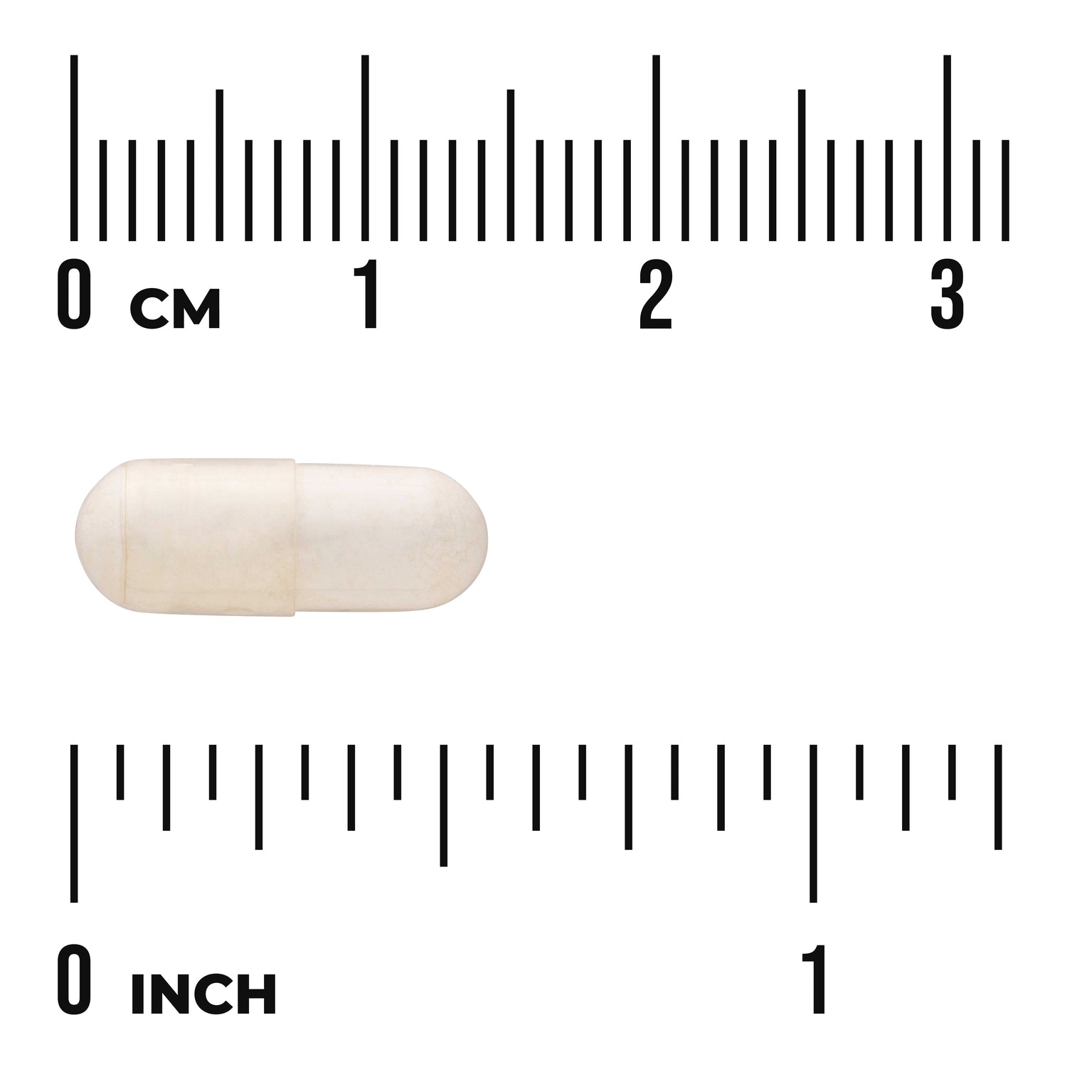 SWU261 | White capsule shown with centimeter and inch rulers for size reference