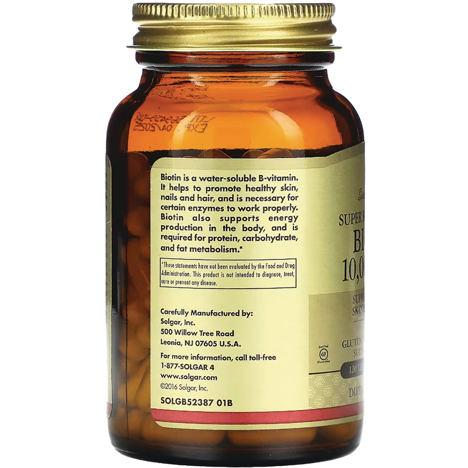 Amber supplement bottle back label showing biotin description and manufacturer contact details