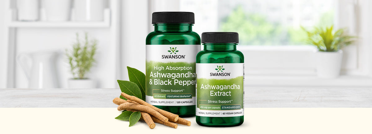 Two Swanson vitamin bottles, Ashwagandha & Black pepper and Ashwagandha Extract with sticks and leaves