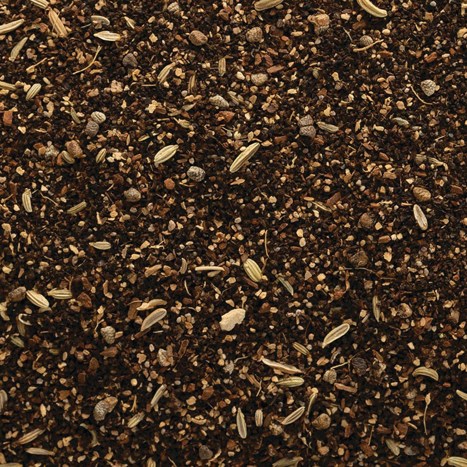FNP029 | close-up of loose herbal seasoning with fennel seeds and crushed spices