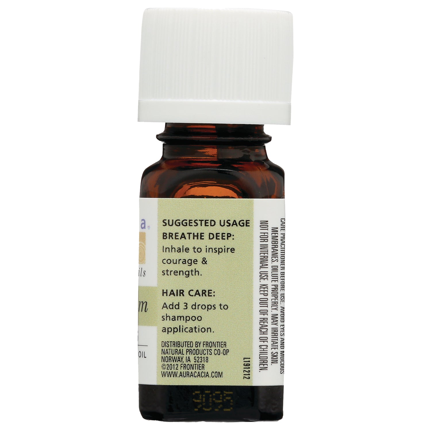 ARC069 | Back of amber essential oil bottle showing label with SUGGESTED USAGE BREATHE DEEP and hair care instructions