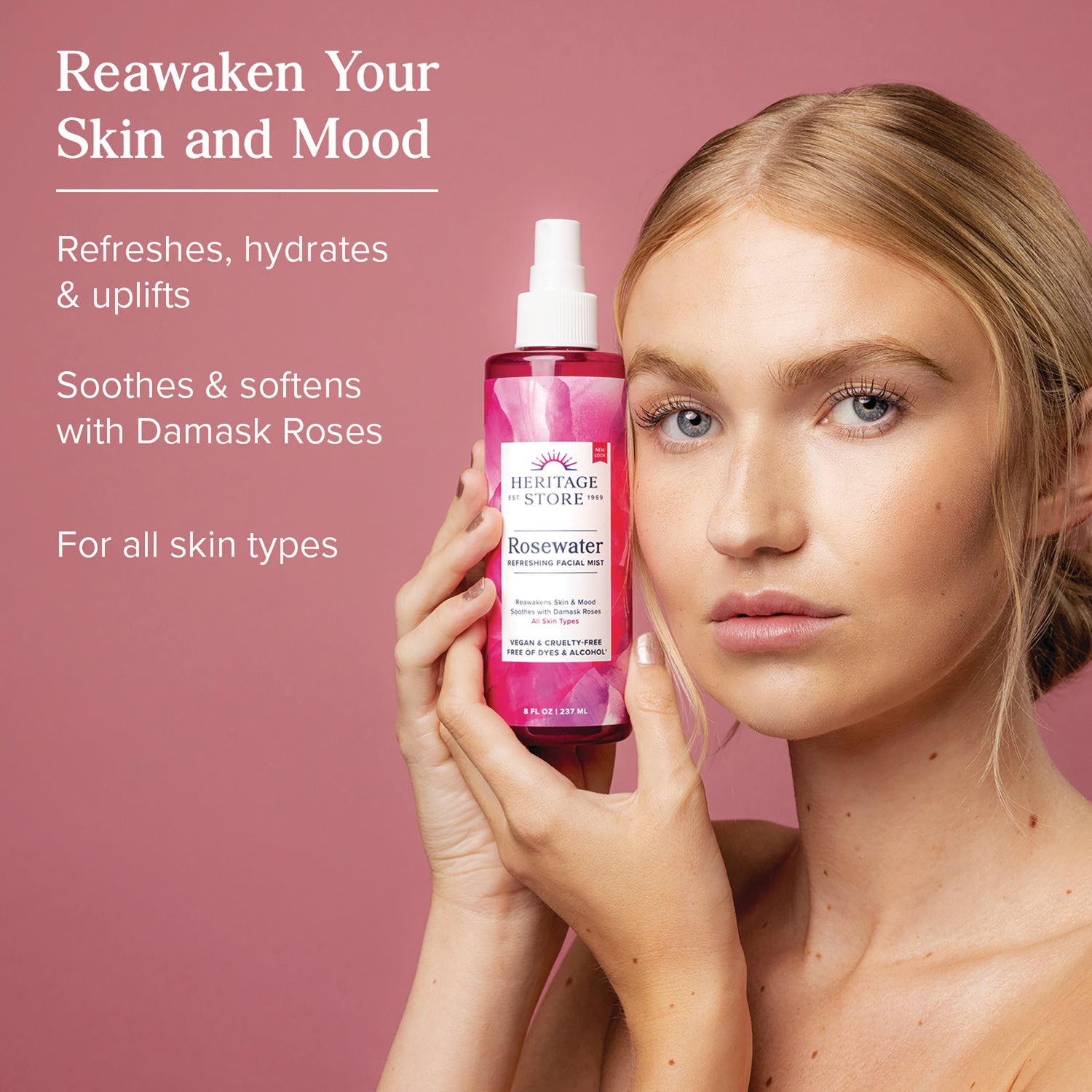 HTG039 | Woman holding Heritage Store Rosewater facial mist beside text Reawaken Your Skin and Mood on pink background
