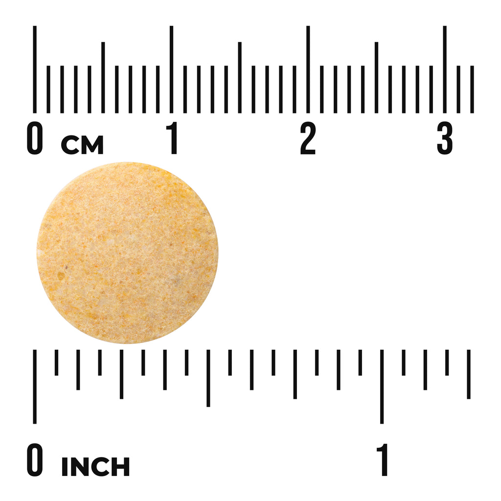 Round tablet with size reference against cm and inch rulers - Thumbnail