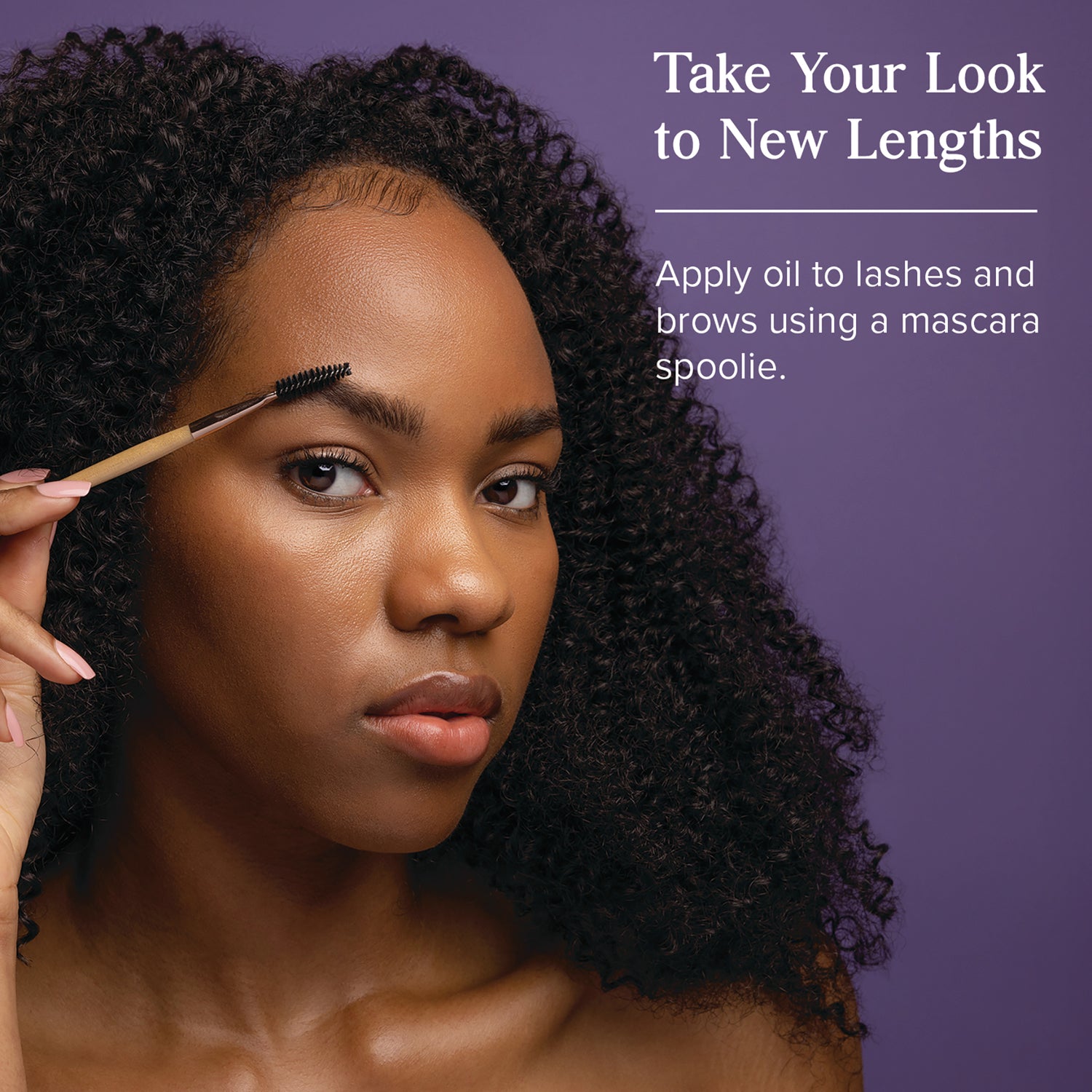 HTG011 | Woman using a mascara spoolie on her eyebrow against a purple background with text Take Your Look to New Lengths