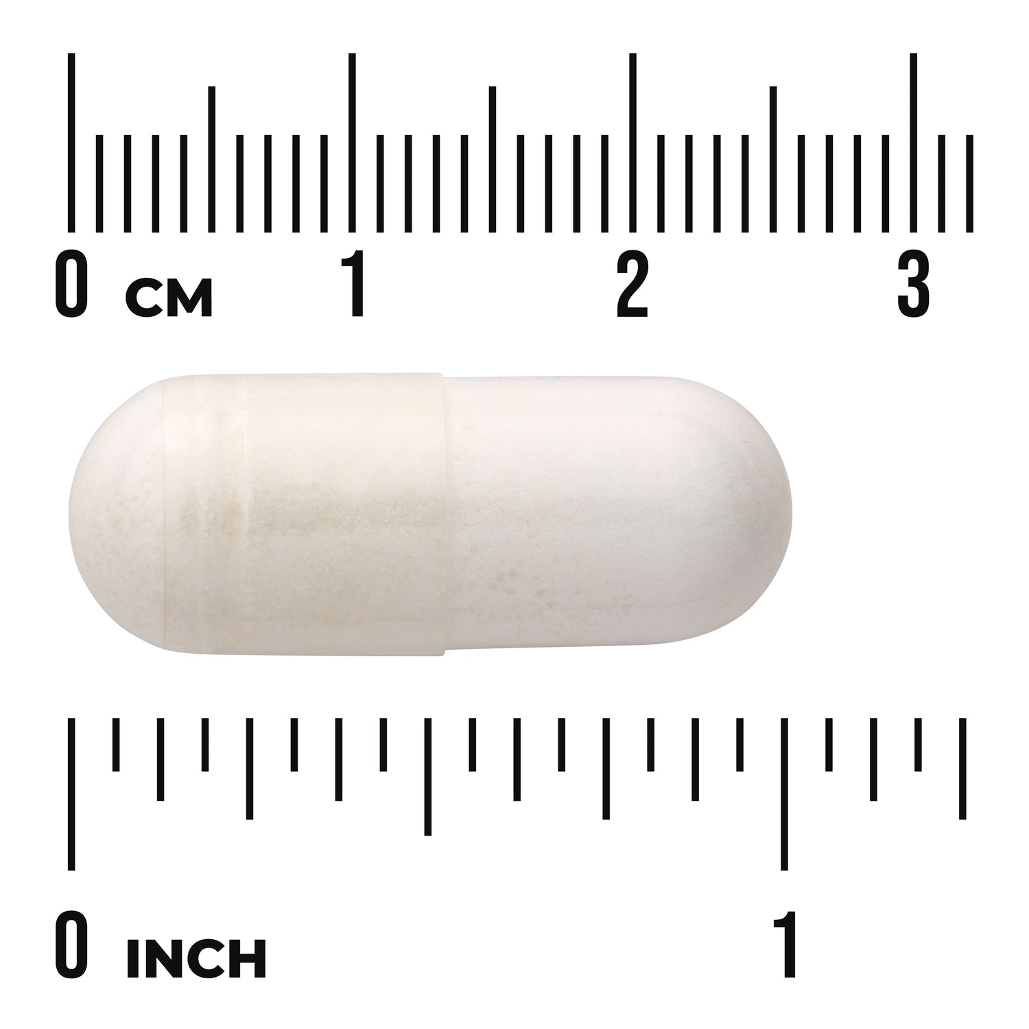 SWU139 | White two-piece capsule centered between centimeter and inch rulers showing size