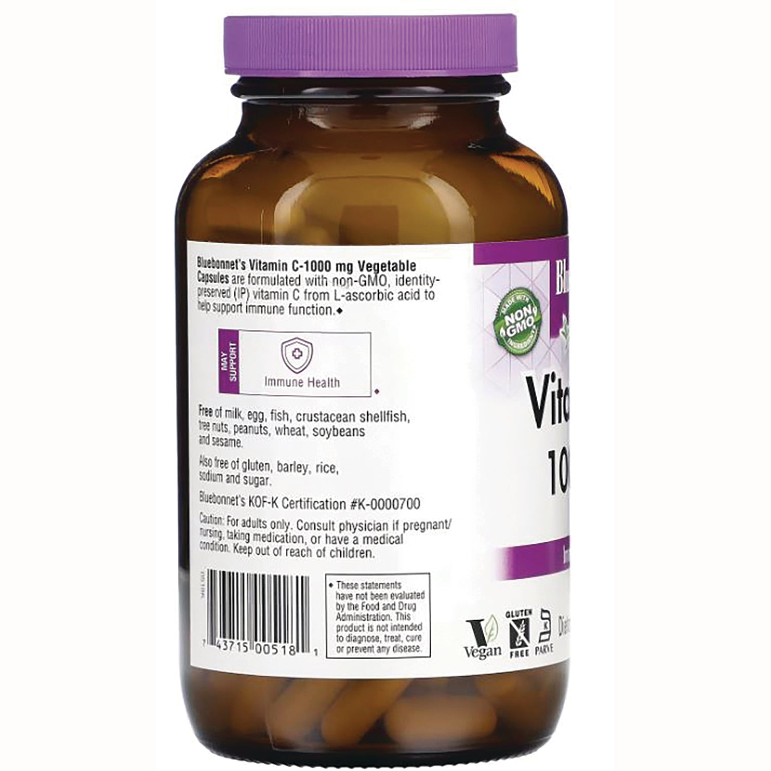 BLU124 | back label of amber supplement bottle showing ingredients, caution text, barcode, and visible capsules