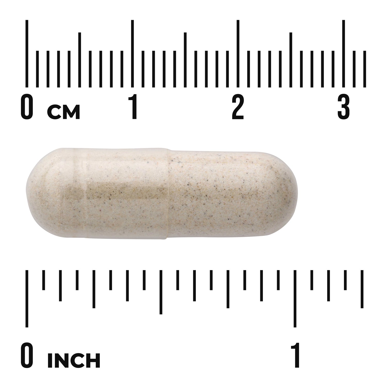 SWD090 | Beige capsule shown against cm and inch rulers for size reference
