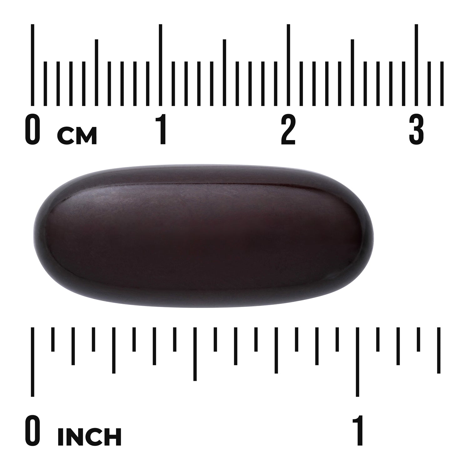 SWU1012 | Dark brown oval softgel capsule centered on ruler markings showing size in centimeters and inches