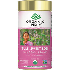 RGN067 | Organic India Tulsi Sweet Rose loose leaf tea canister with pink label showing a woman and herb plants