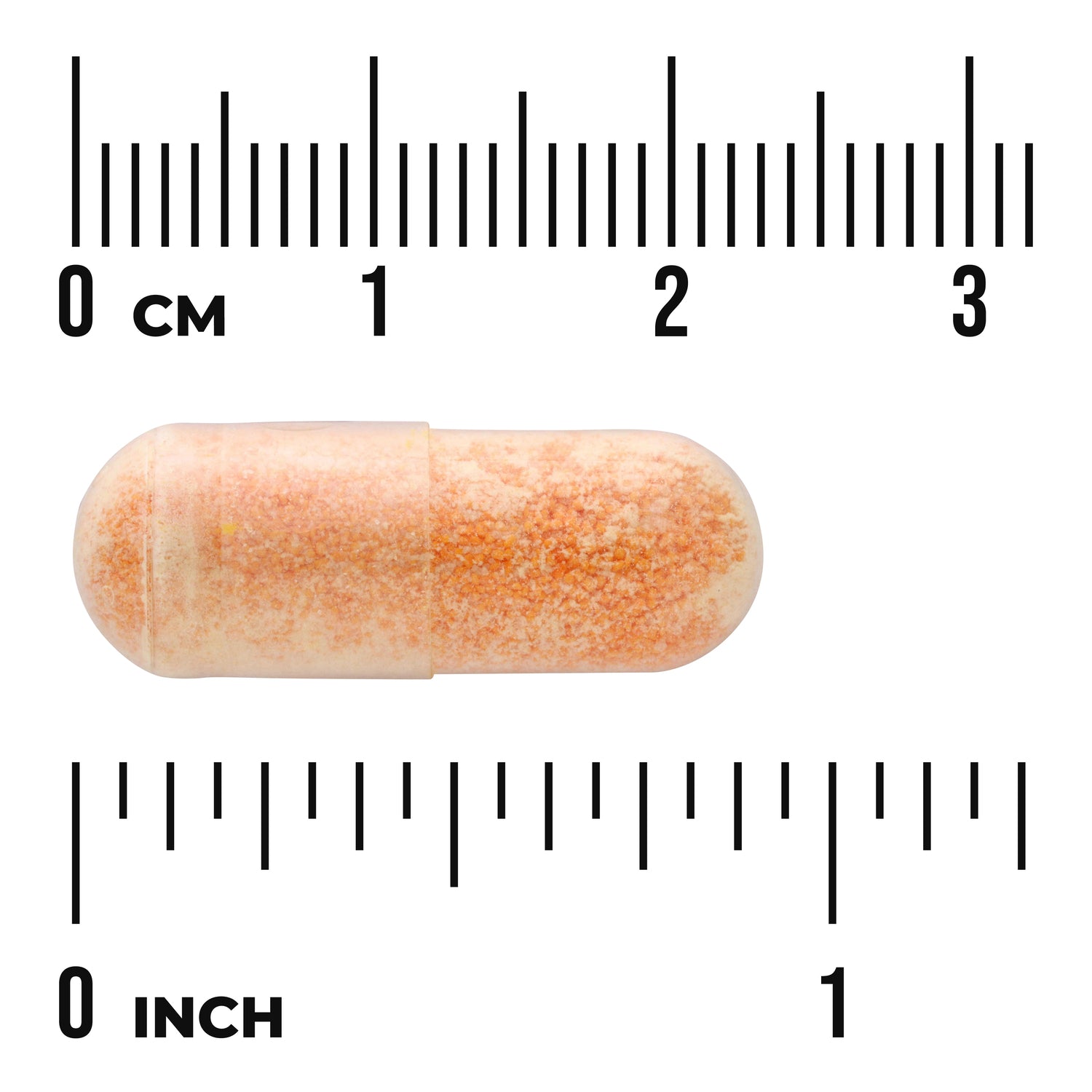 SWU035 | Orange capsule shown to scale with rulers in centimeters and inches