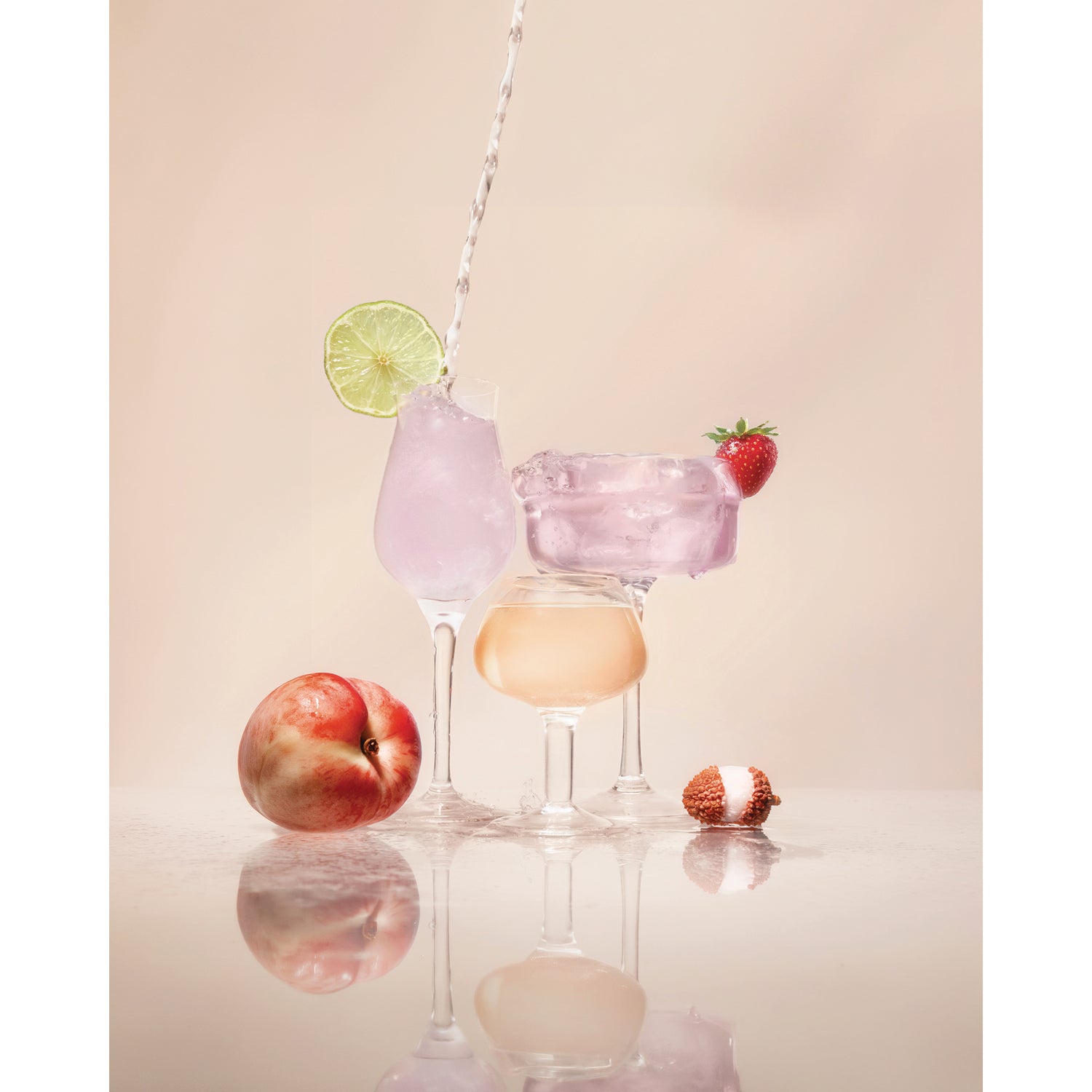 KTO002 | Mixed fruit cocktails in elegant glasses with citrus, strawberry, peach, and lychee accents