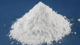 Pile of white powder on a blue background