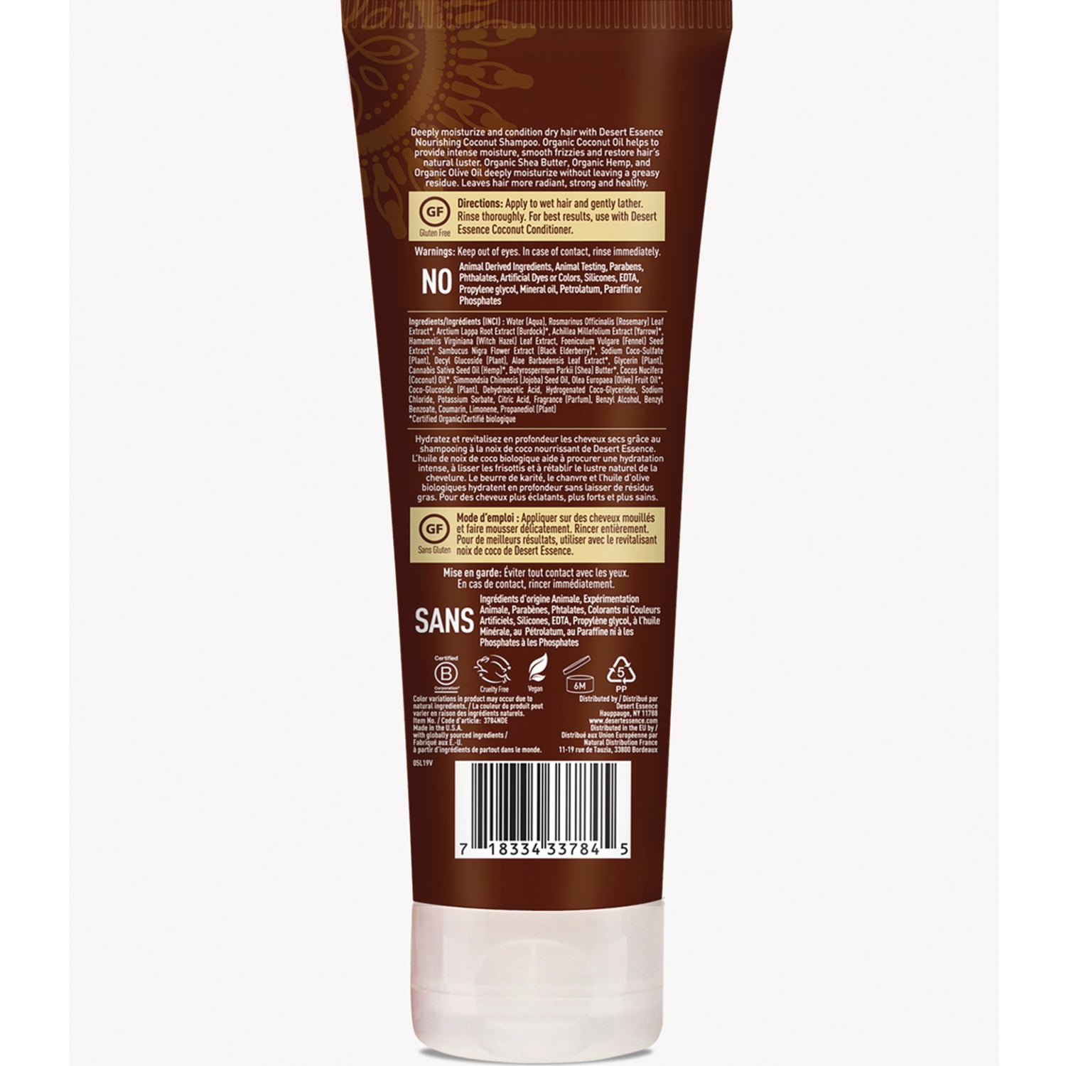Back of brown shampoo tube showing ingredients list, directions, certification icons and barcode