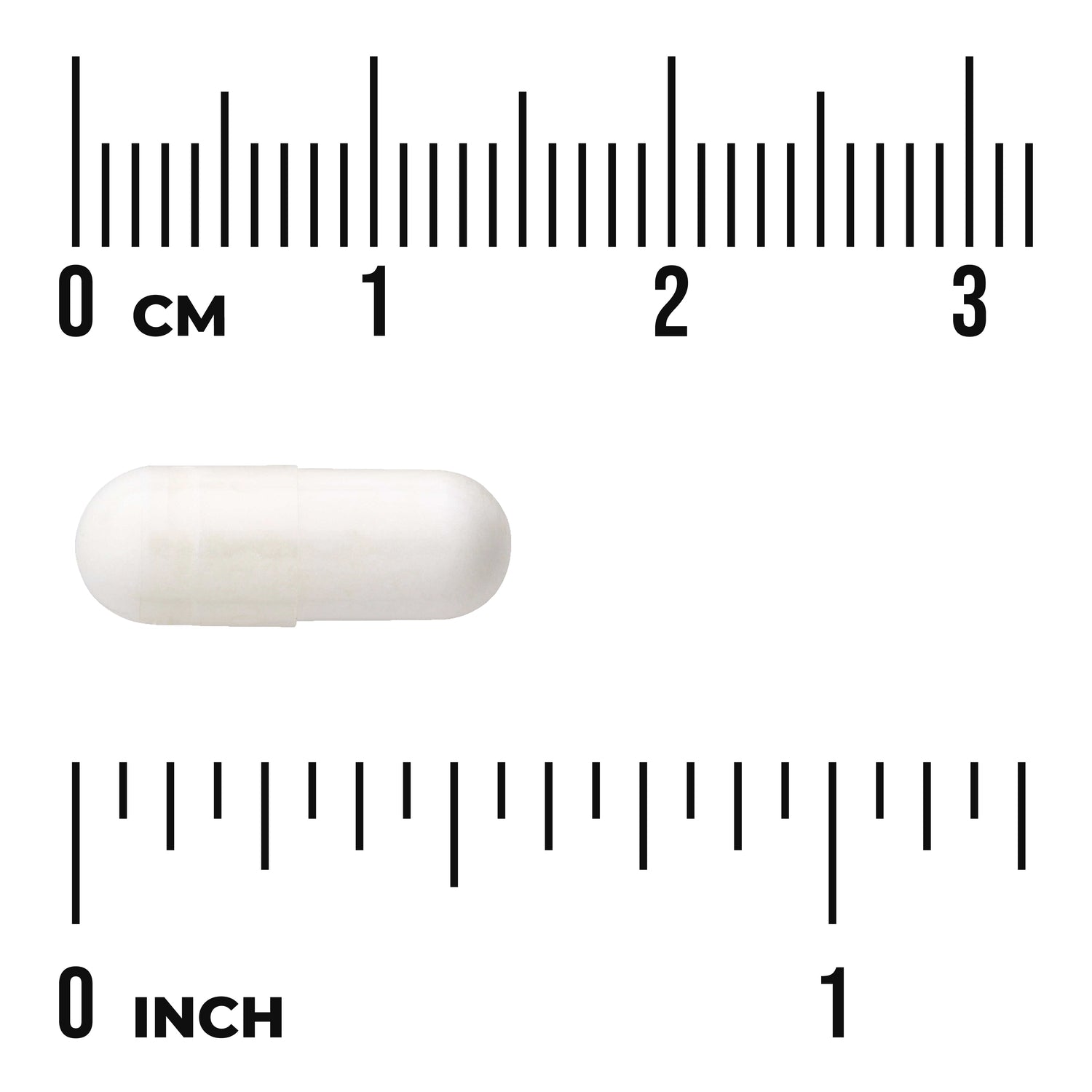 SW599 | White capsule with size reference rulers labeled cm and inch