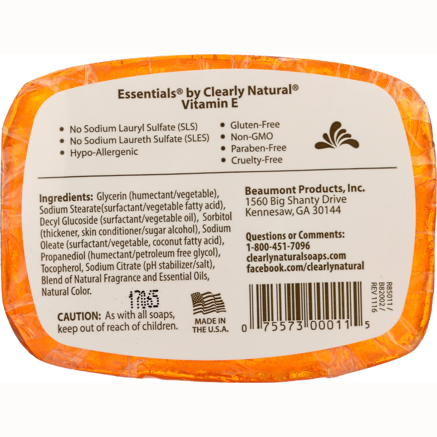 CLN010 | Back label showing Essentials by Clearly Natural Vitamin E ingredients, cautions, barcode and manufacturer info on orange-wrapped soap