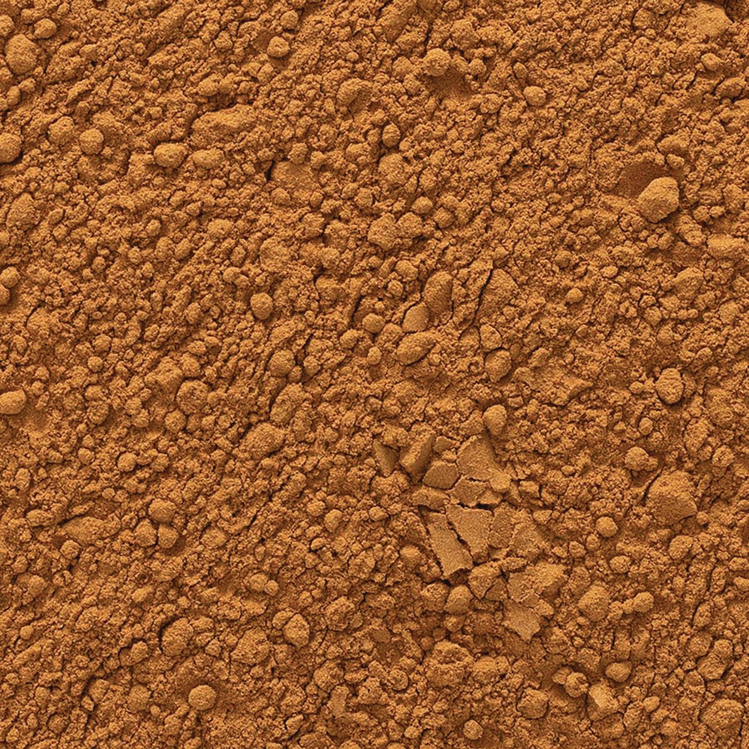 FNP022 | Close-up of fine brown powder with granules and small clumps