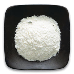 FNP042 | mound of white powder on a black square plate