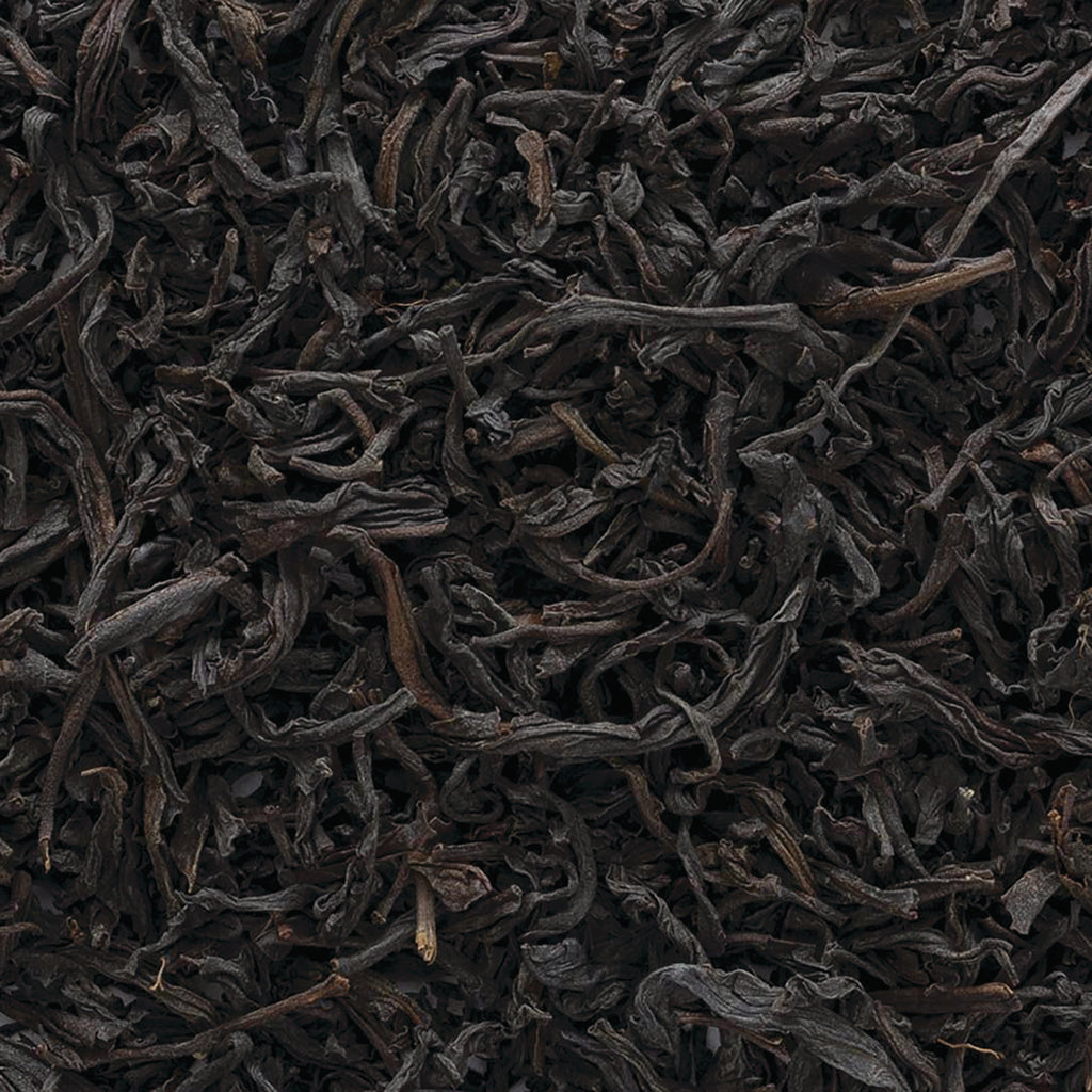FNP085 | Close-up of loose dried black tea leaves with dark twisted leaves - Thumbnail