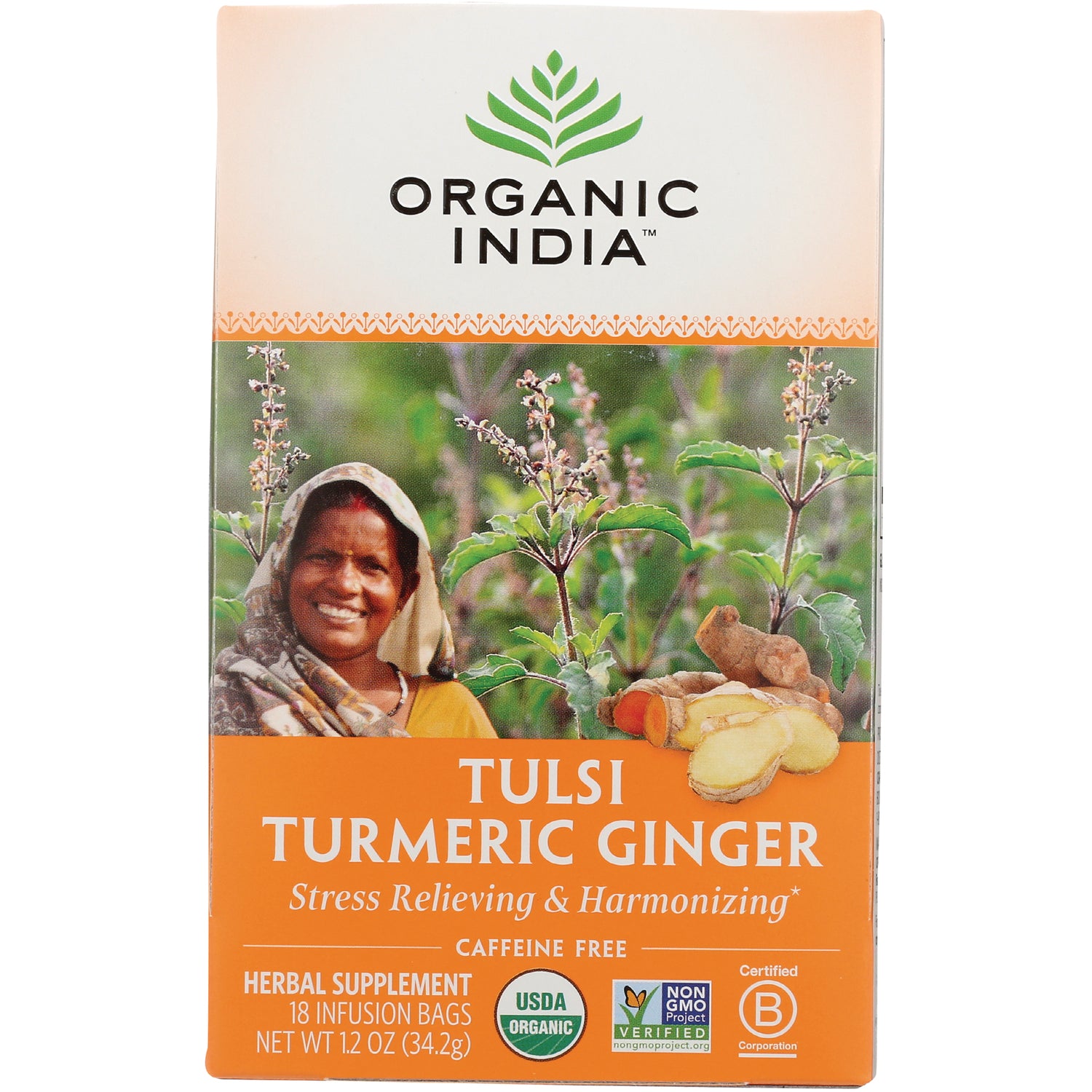 RGN074 | Organic India Tulsi Turmeric Ginger tea box front showing smiling woman, turmeric and ginger roots, USDA Organic badge