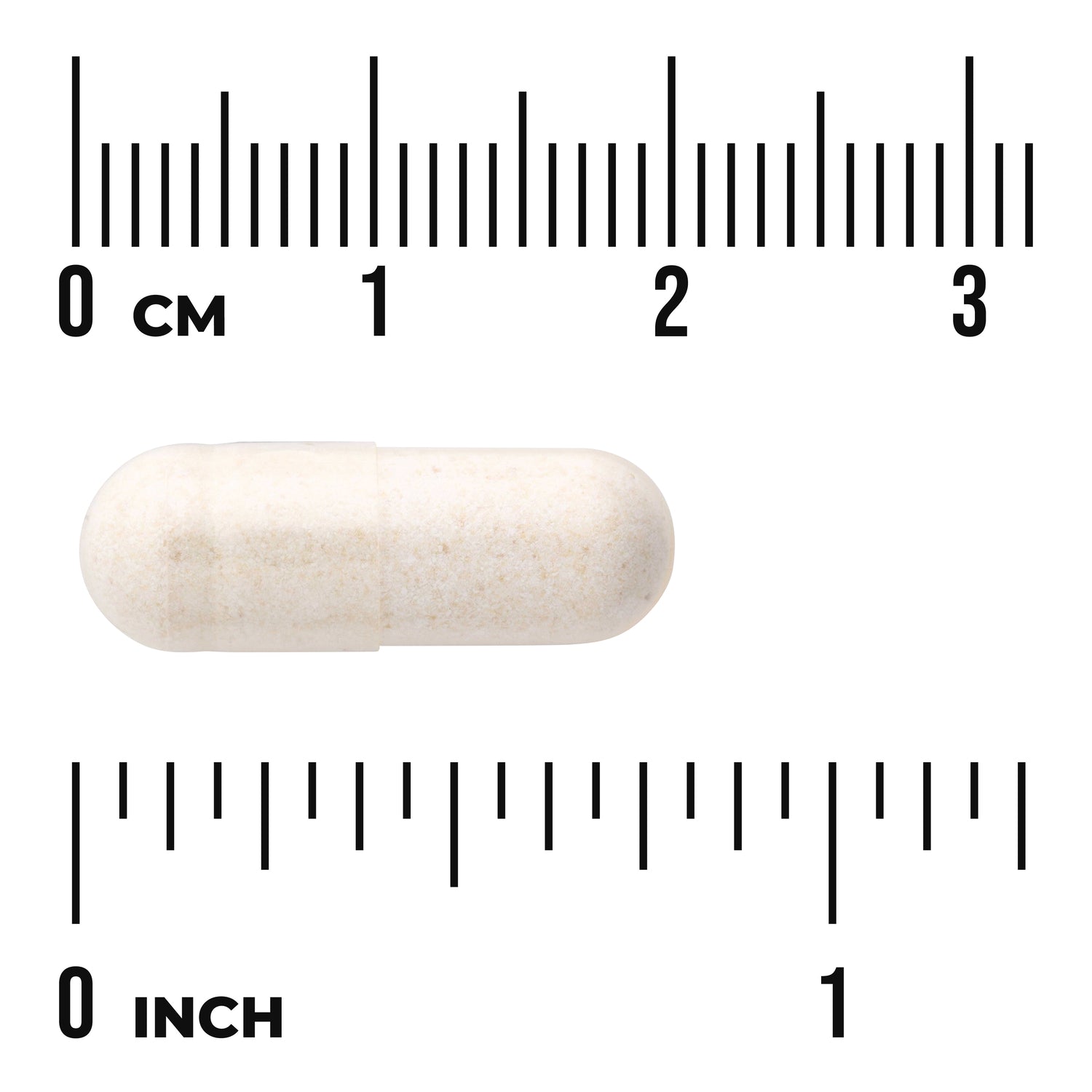 SWU281 | White capsule shown with rulers in centimeters and inches for size