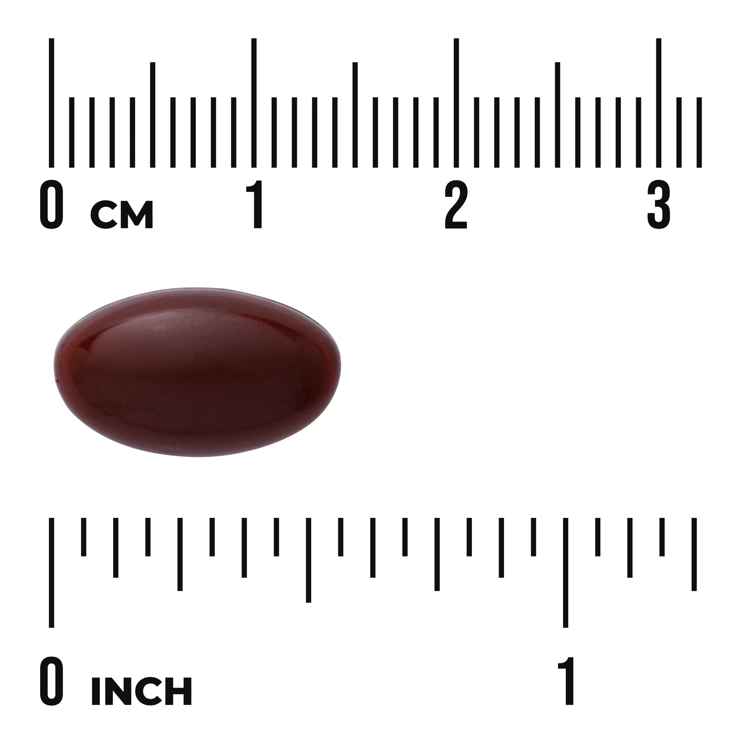 SWU925 | Brown oval softgel capsule on ruler scale showing about 2 cm length with visible cm and inch markings