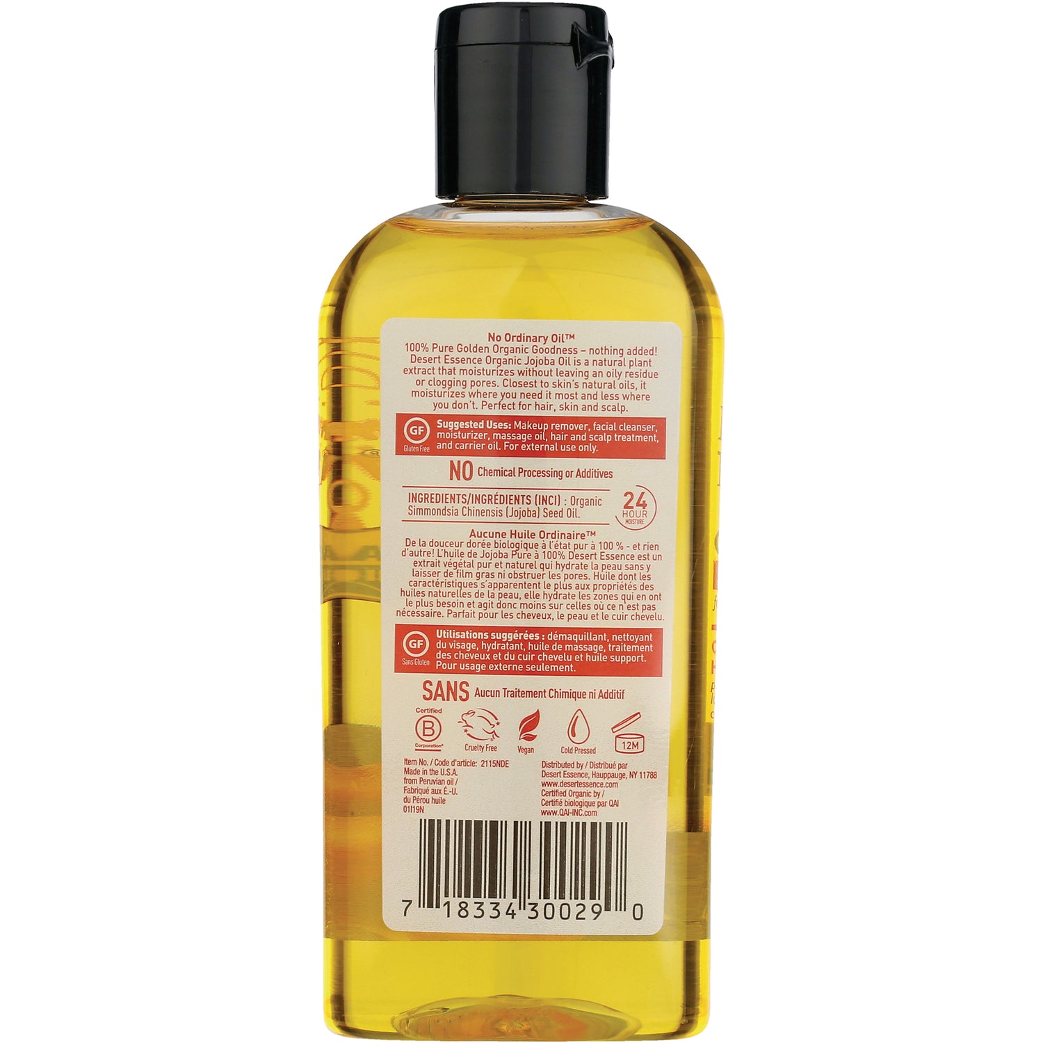 DST075 | Back label of clear bottle of golden oil showing ingredients, usage icons and barcode