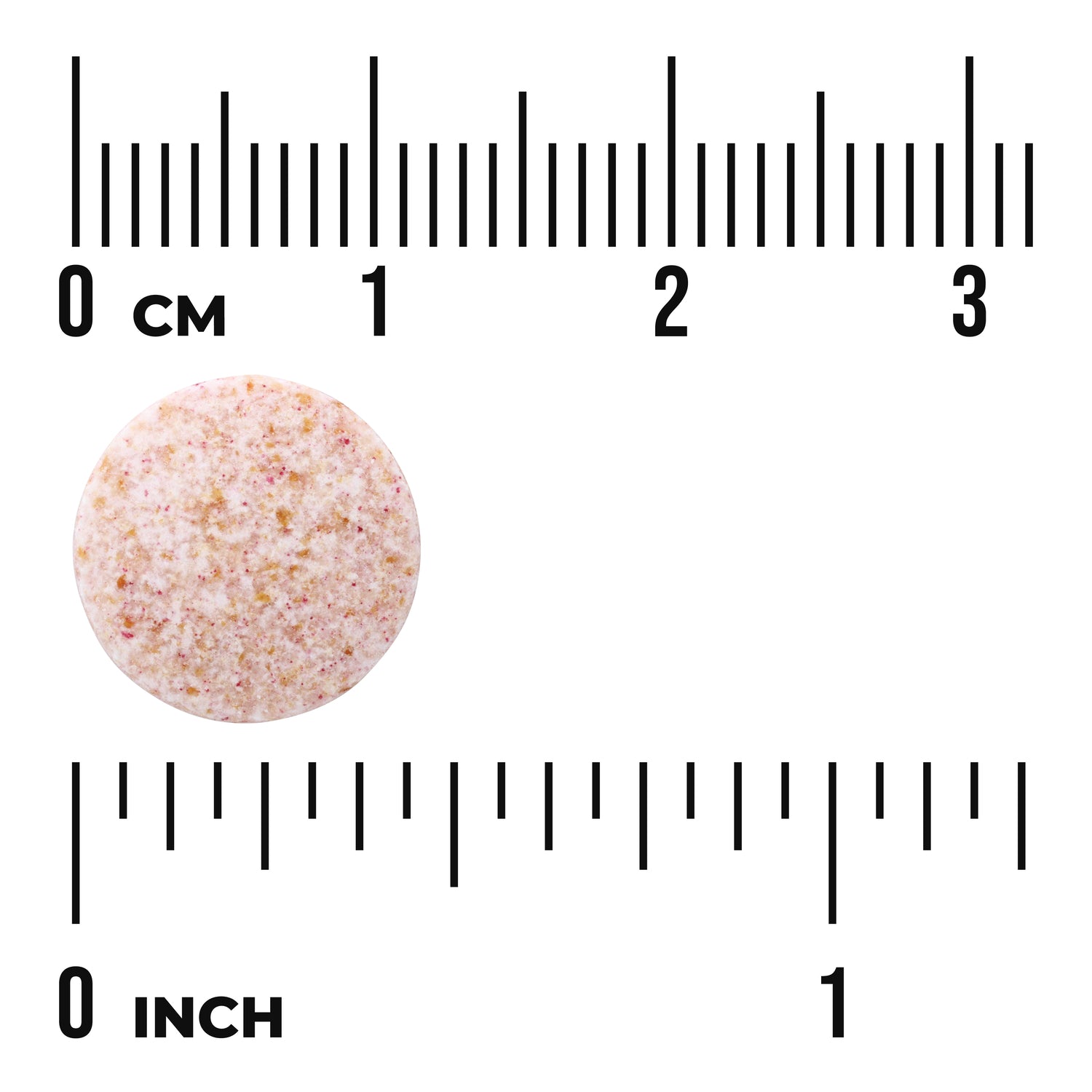 SWU1024 | Round speckled tablet shown against inch and centimeter rulers