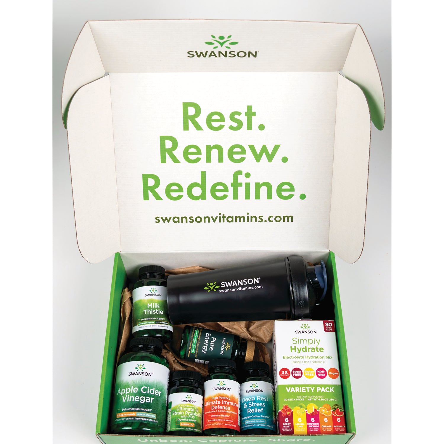 SW1980 | Open Swanson box with supplements and 'Rest. Renew. Redefine.' swansonvitamins.com