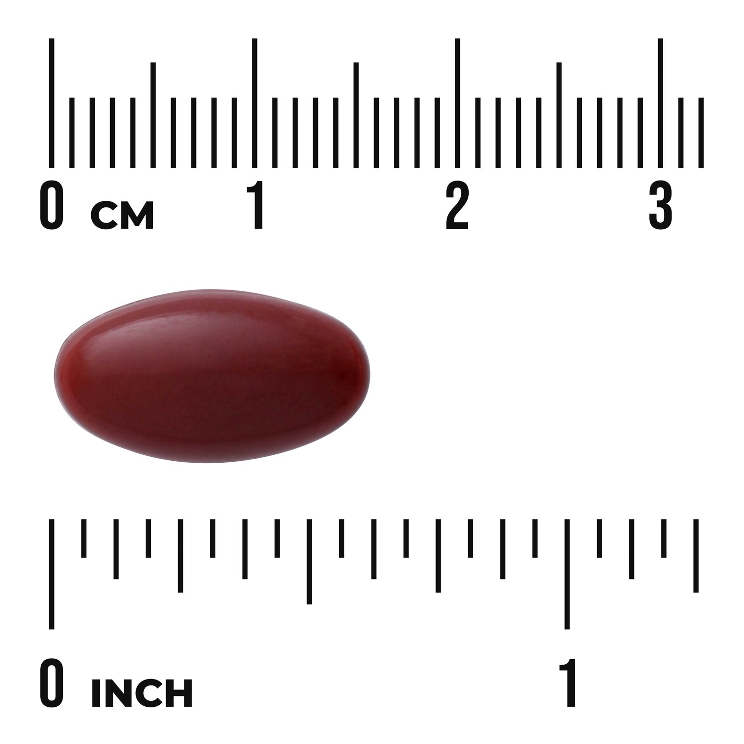 SWU1022 | Red softgel shown with rulers in cm and inches to indicate capsule size