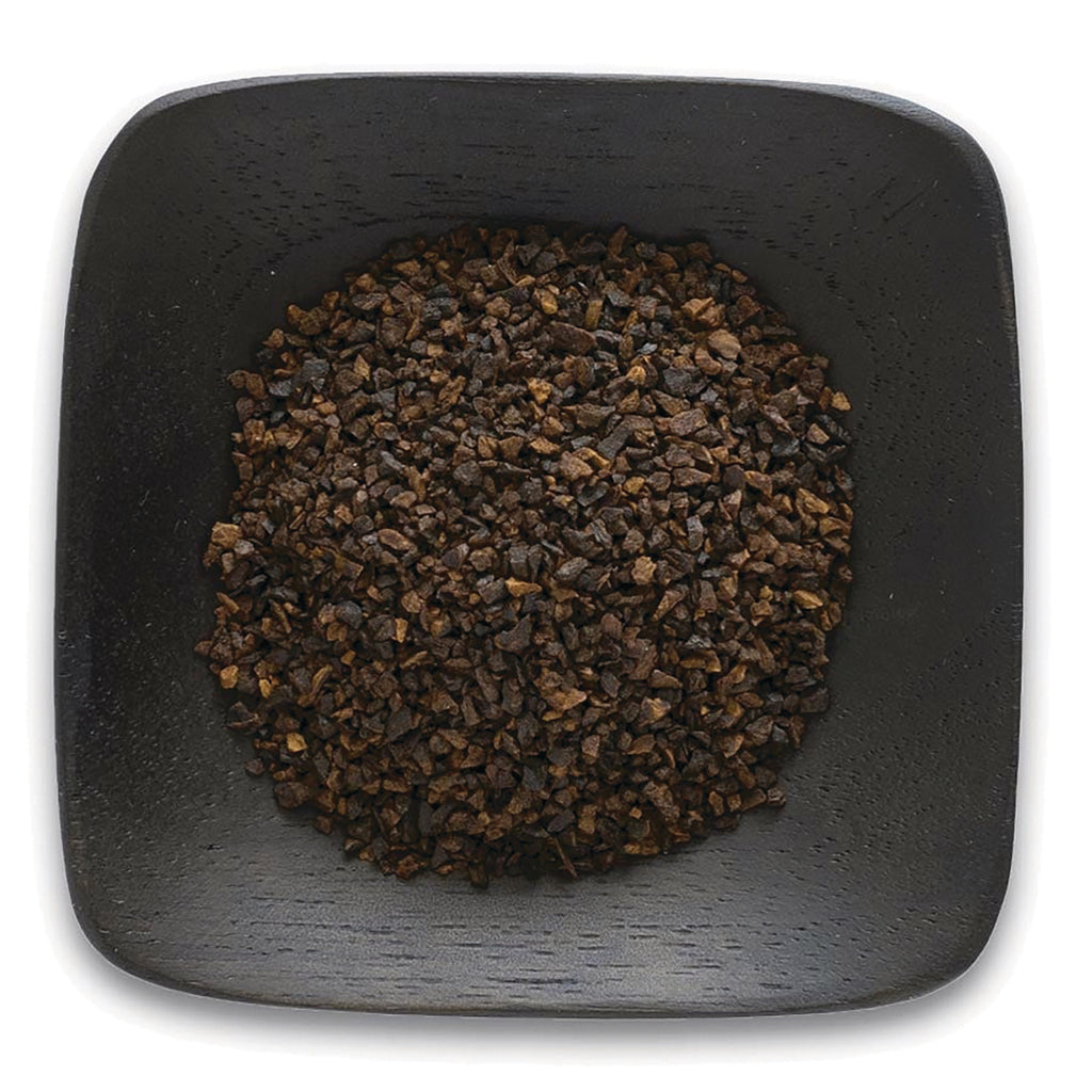 FNP385 | top-down view of coarse dark brown granules in a square black wooden bowl - Thumbnail