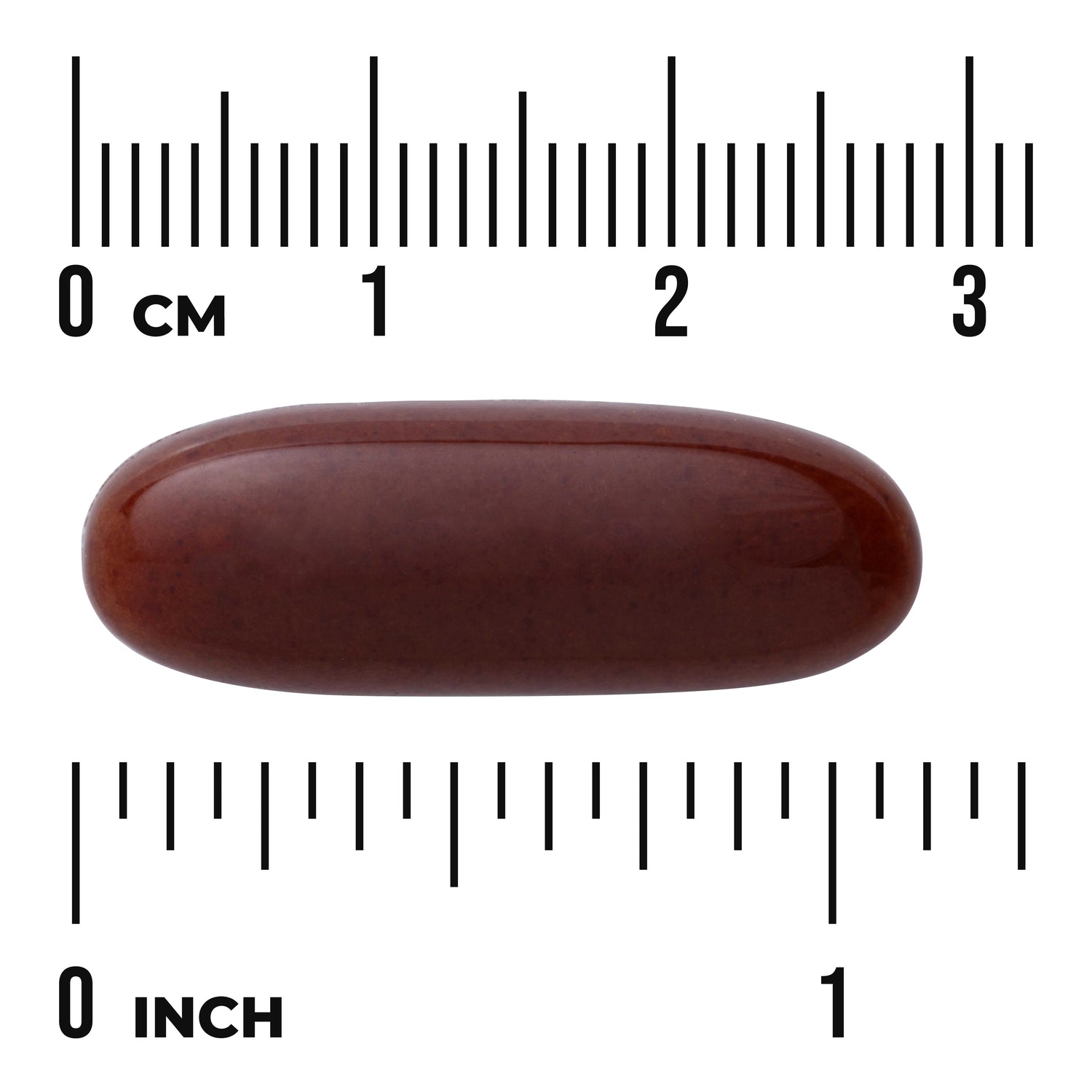 SWU259 | Brown oval softgel capsule on white background with cm and inch rulers showing about 3 cm (1 in) length