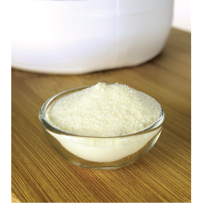 SW1233 | Fine powder in a small glass bowl on a wooden surface - Thumbnail