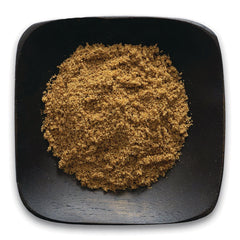 FNP034 | Ground brown powder piled on a black square wooden dish