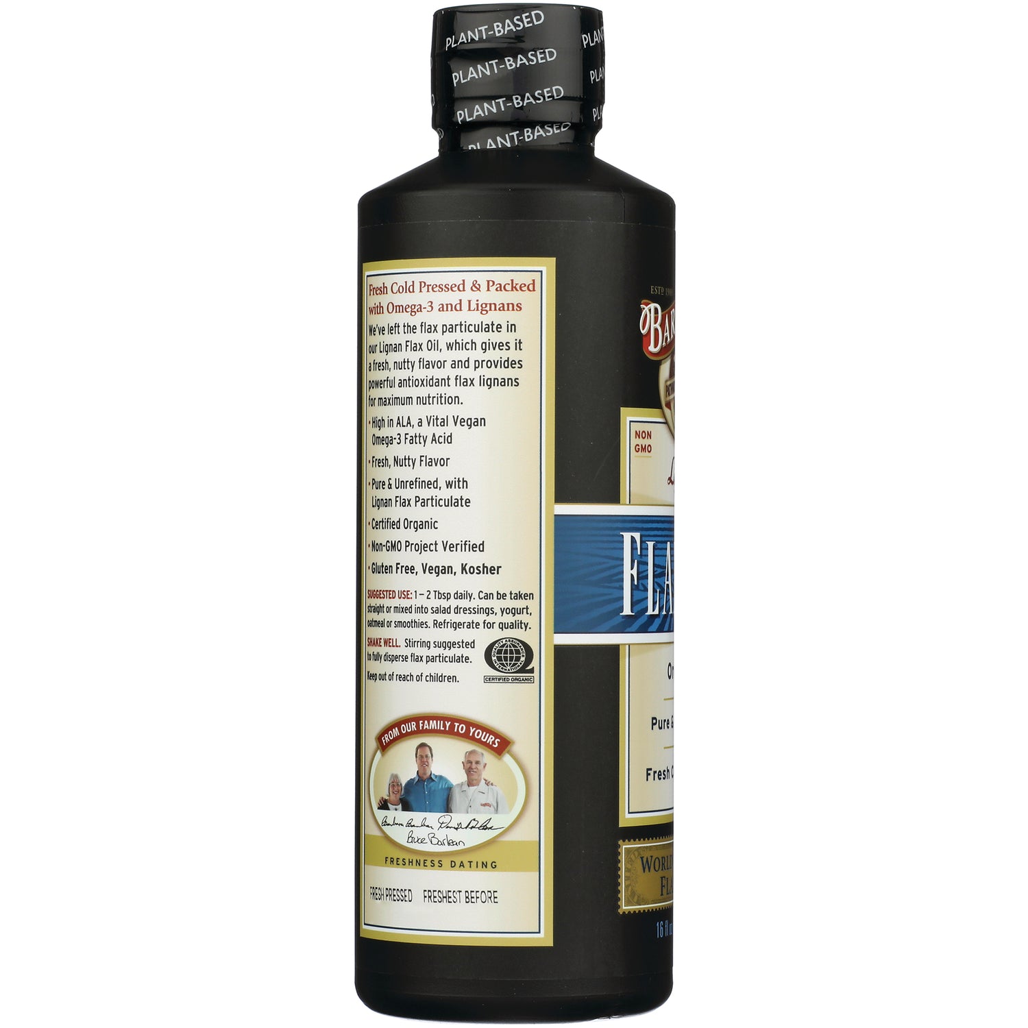 Back label of dark bottle showing ingredients, certifications, usage information and a small family photo; cap reads PLANT-BASED
