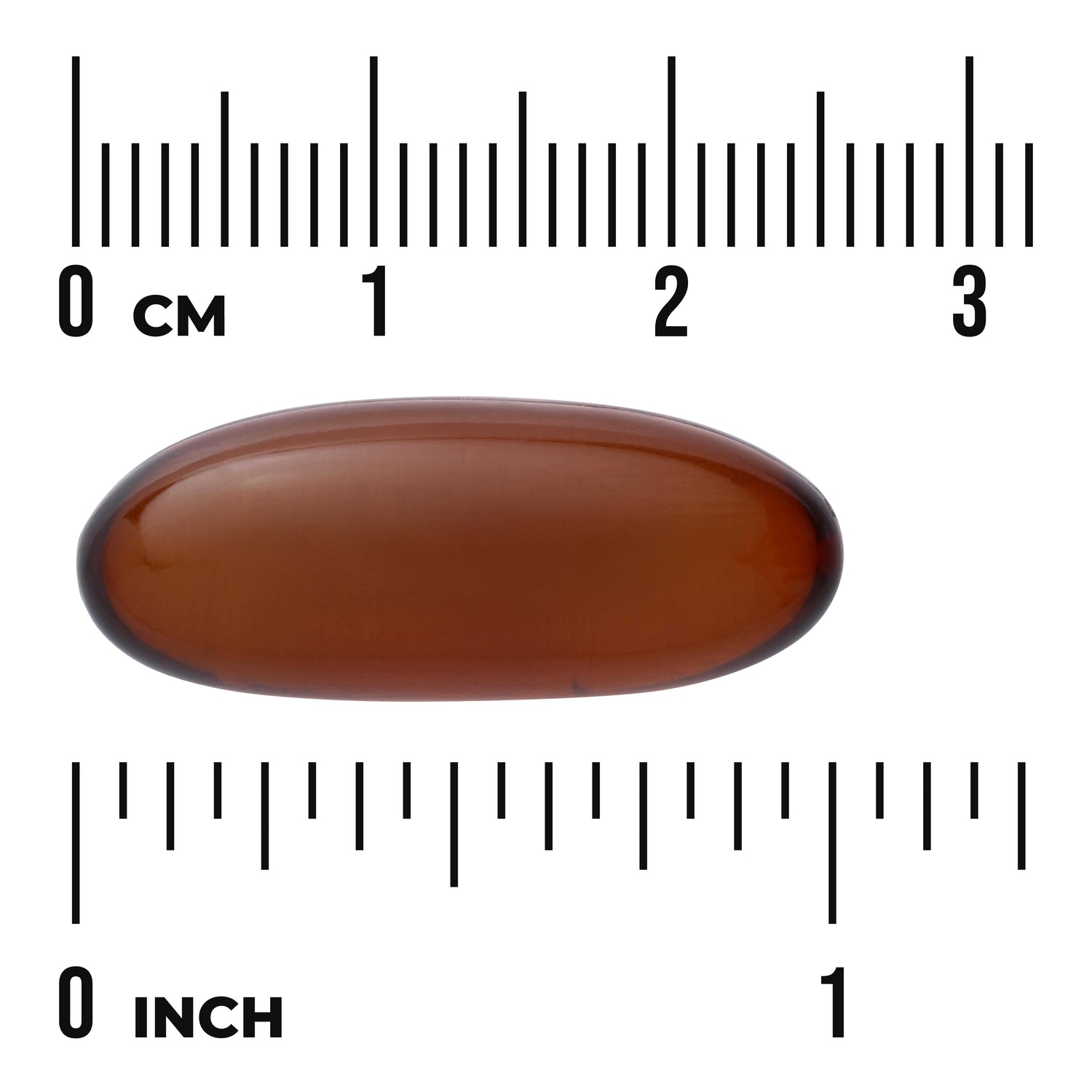 SWU681 | Brown oval softgel capsule shown between centimeter and inch rulers to indicate size