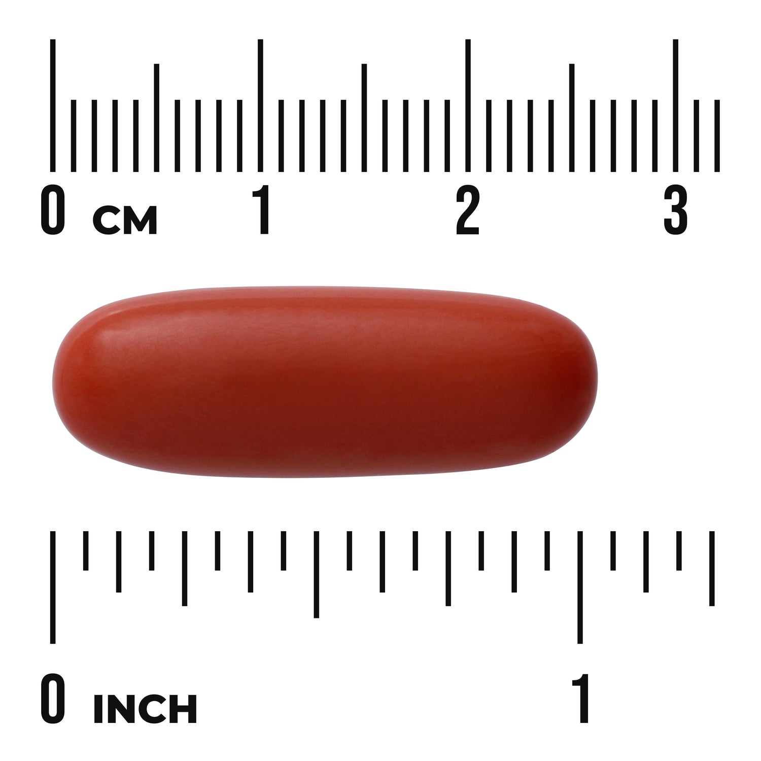 SWL020 | Red oblong softgel pill centered between centimeter and inch rulers showing size scale