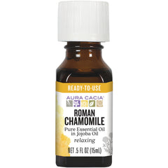 ARC231 | Amber glass bottle with white cap labeled AURA CACIA Roman Chamomile pure essential oil in jojoba oil 0.5 fl oz
