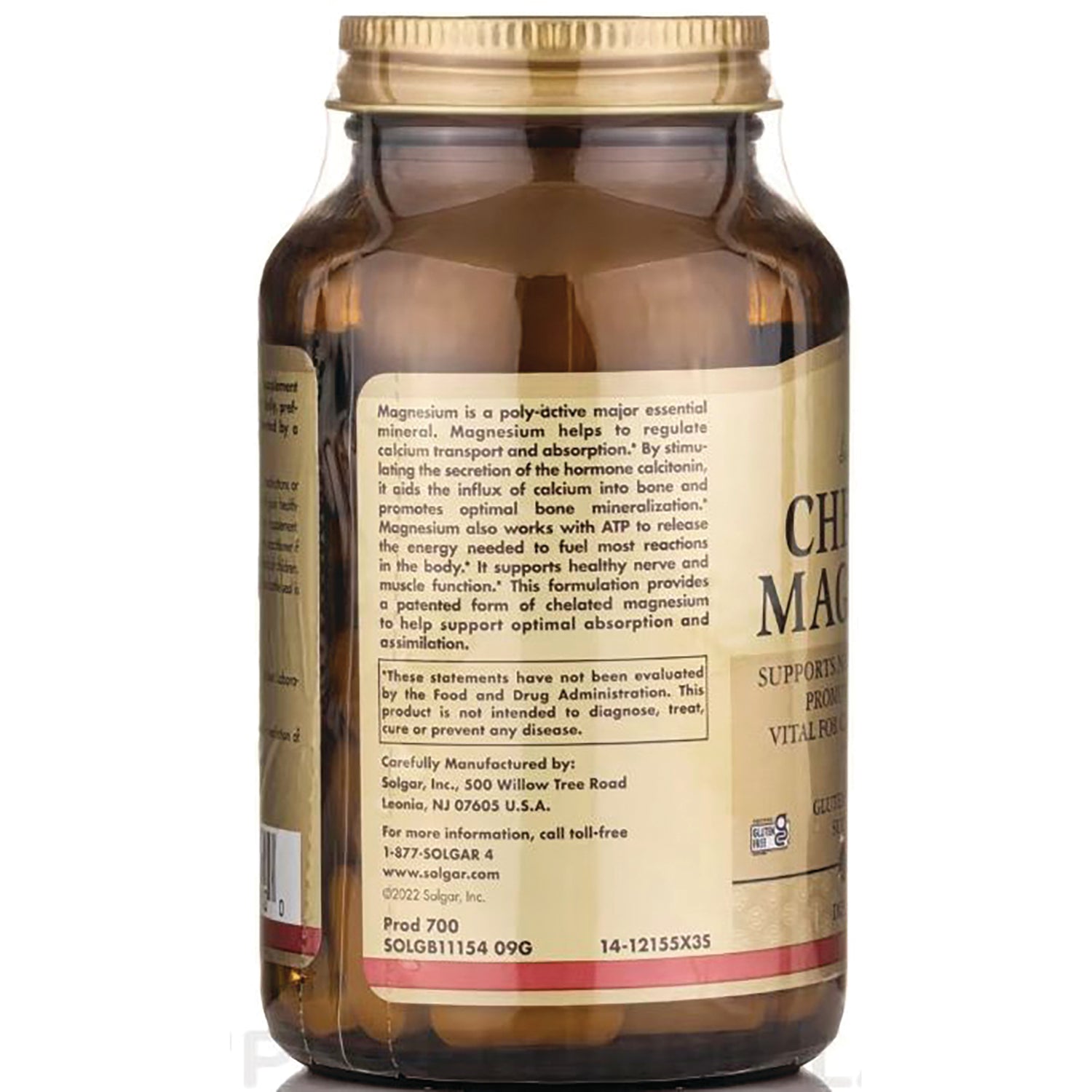 Back label of amber supplement bottle showing magnesium facts, FDA disclaimer, manufacturer details and product codes